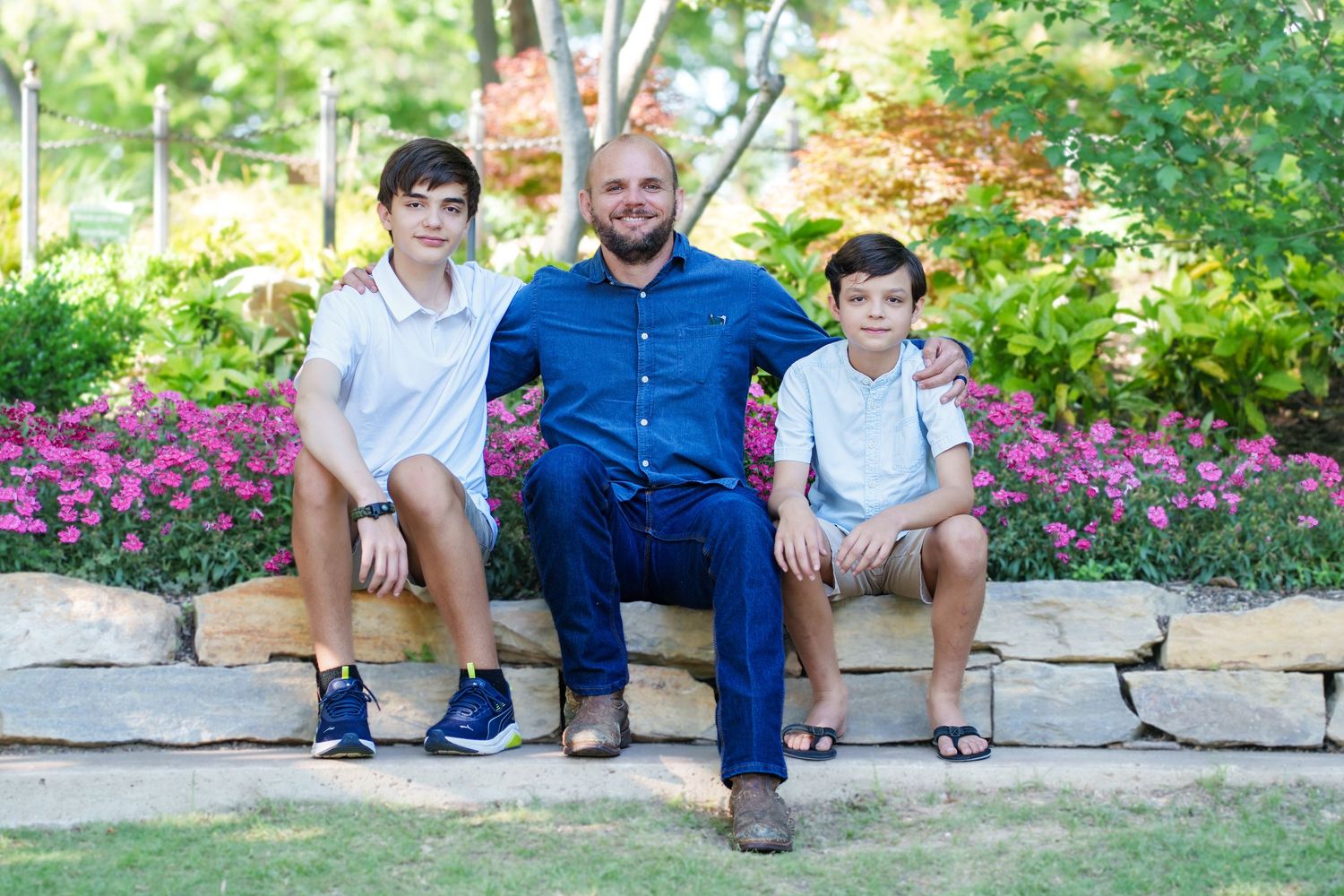 Spring family session Grapevine Botanical Garden Grapevine Tx Dad daughter sons poses sunset golden hour outdoors flowers bridge white