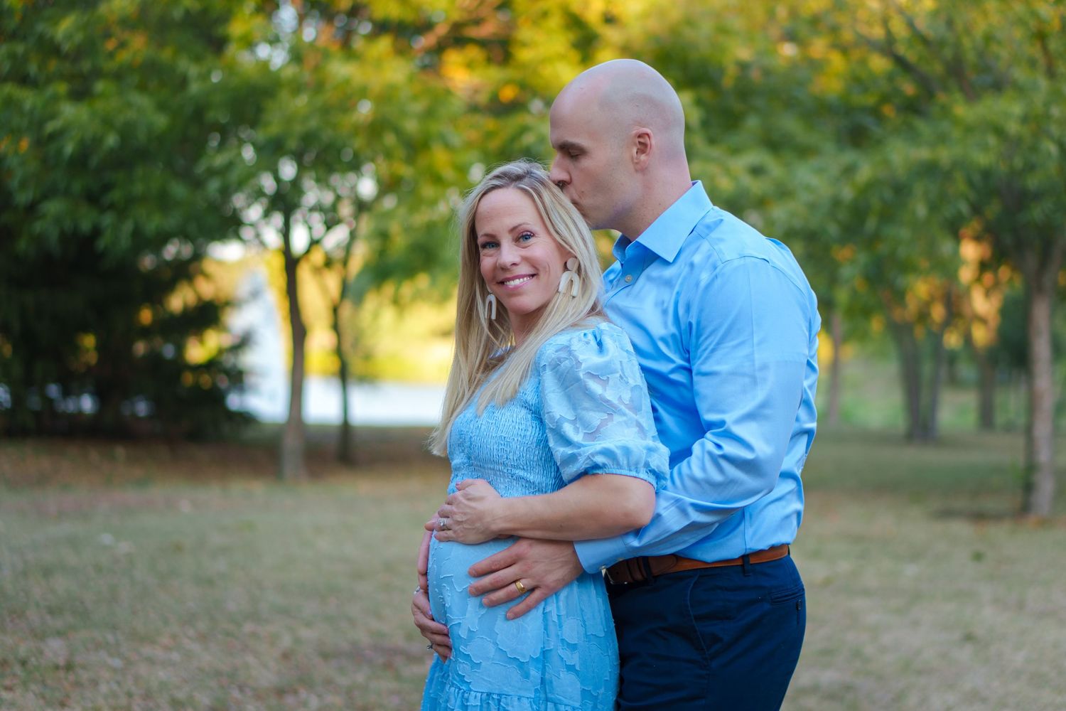 maternity photo session fall family mini baby boy expecting mom big sisters blue dress and blue eyes boots outdoors