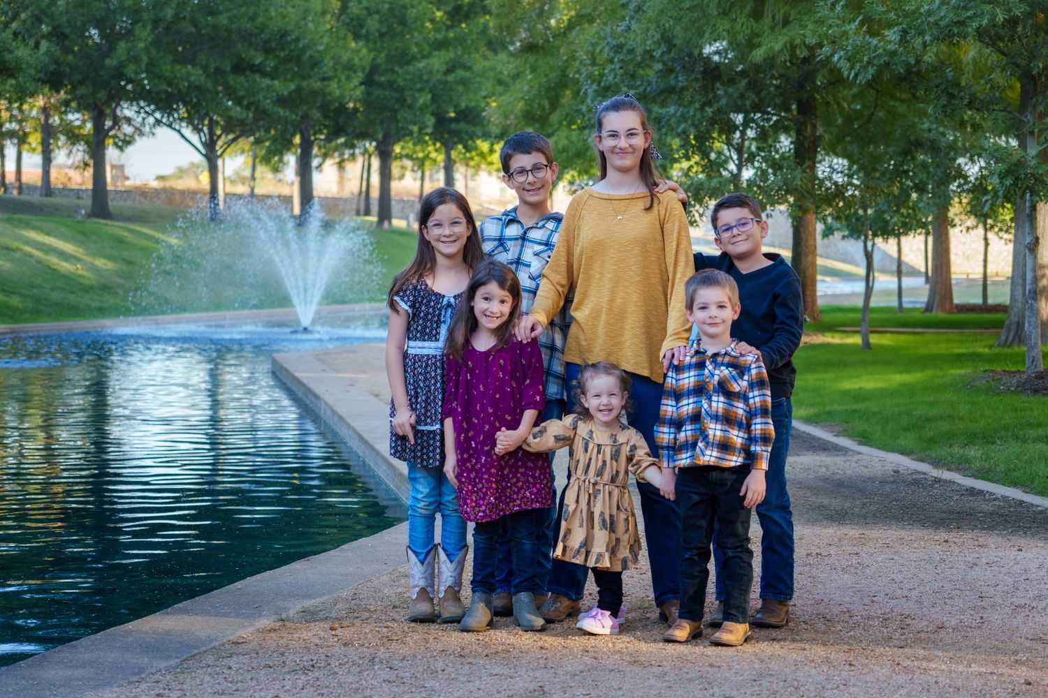 Fall family session mini urban big family extended outdoors rocks pond golden Westlake Texas photography Christmas card