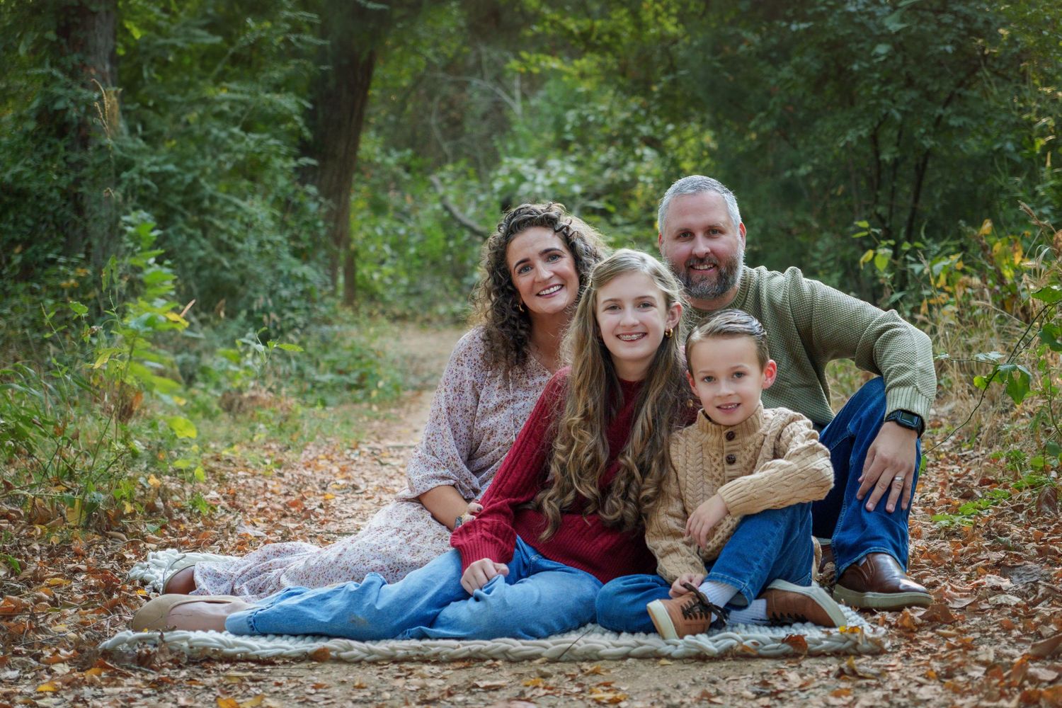 portrait photography Fall family mini session fall colors family love sitting orange leaves