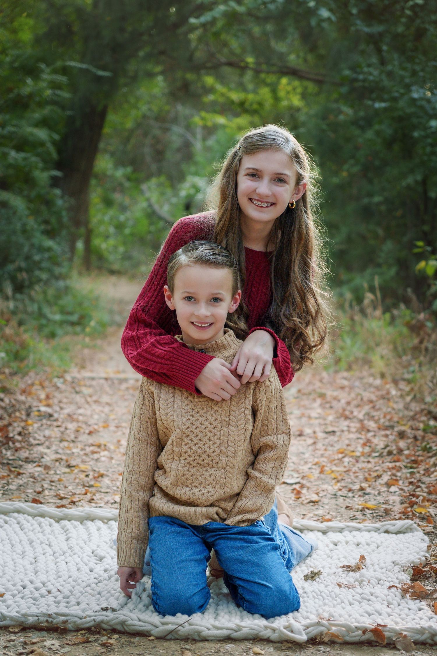 portrait photography Fall family mini session fall colors family love sitting orange leaves brother sister siblings love