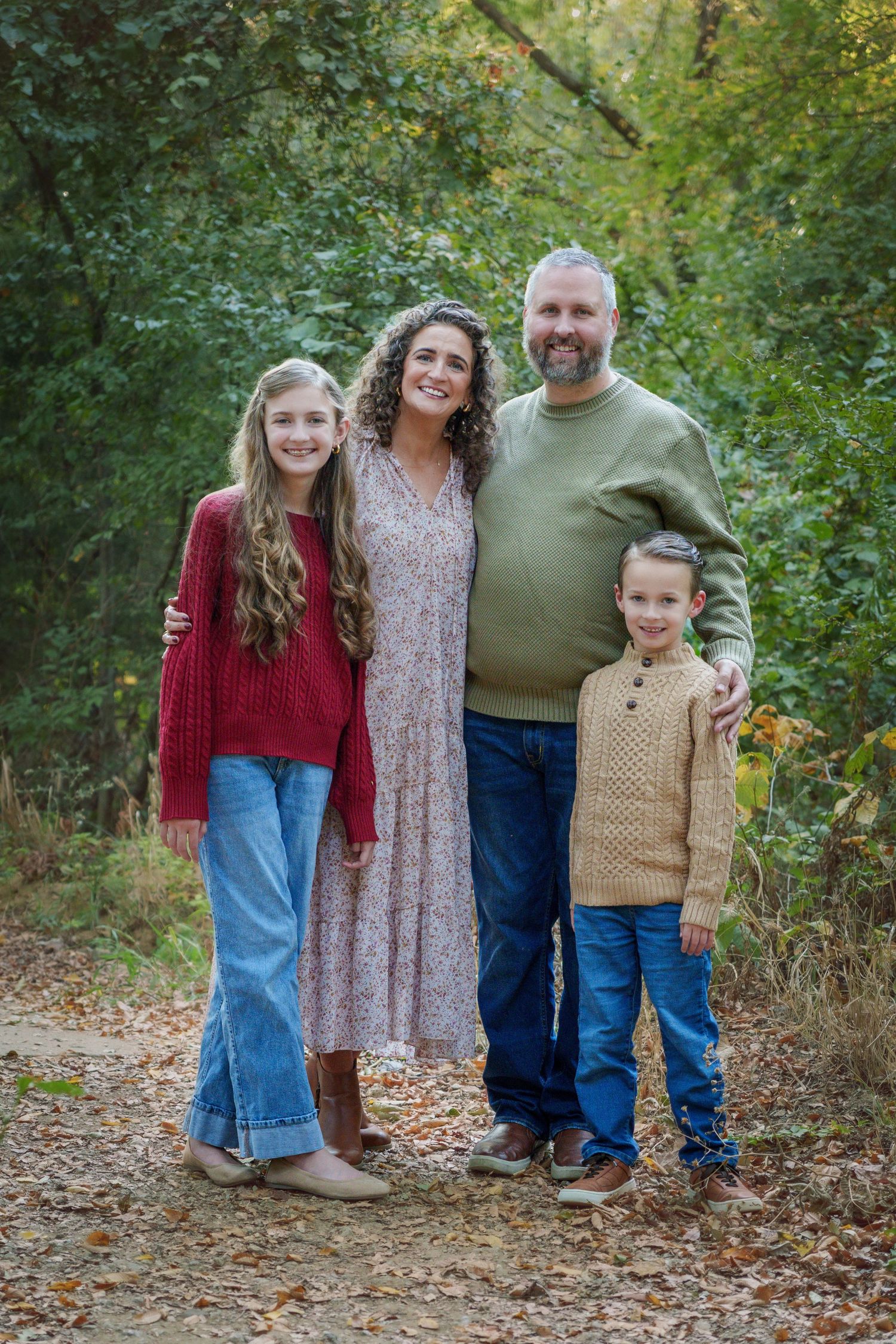 portrait photography Fall family mini session fall colors family love sitting orange leaves outdoors orange leaves love