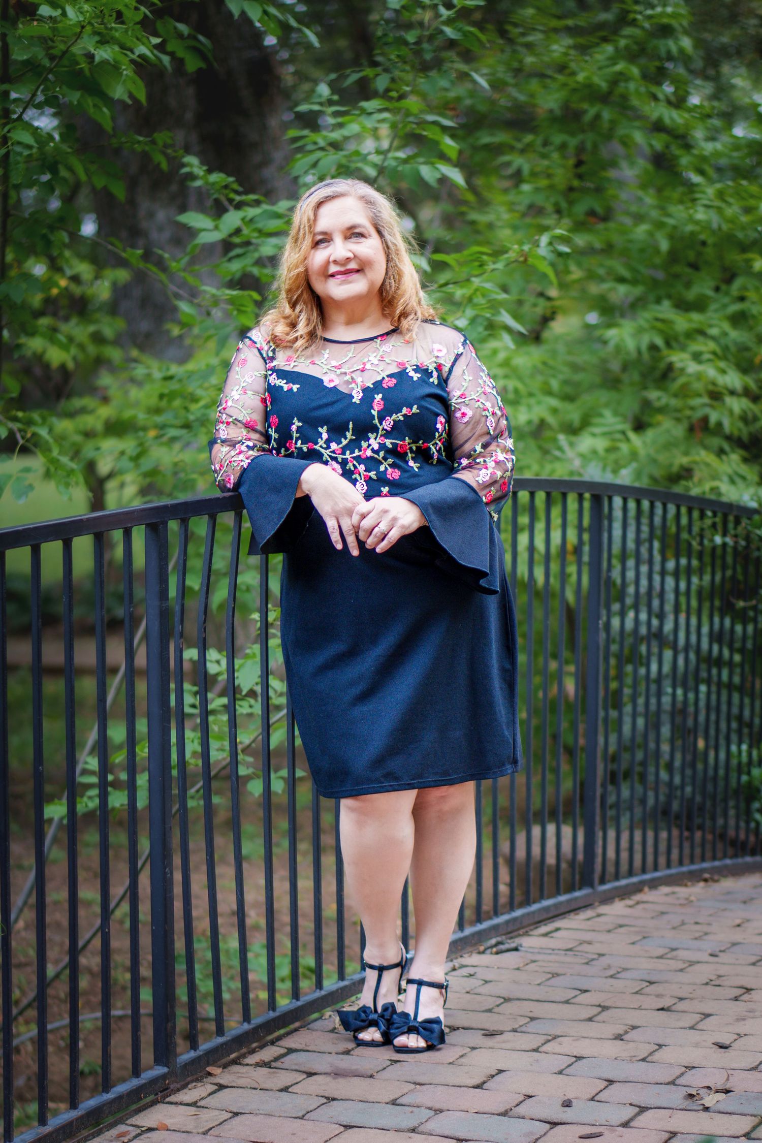 Headshot 60th birthday celebrate photo shoot Grapevine Botanical Garden outdoors hat black outfit beautiful dress photos