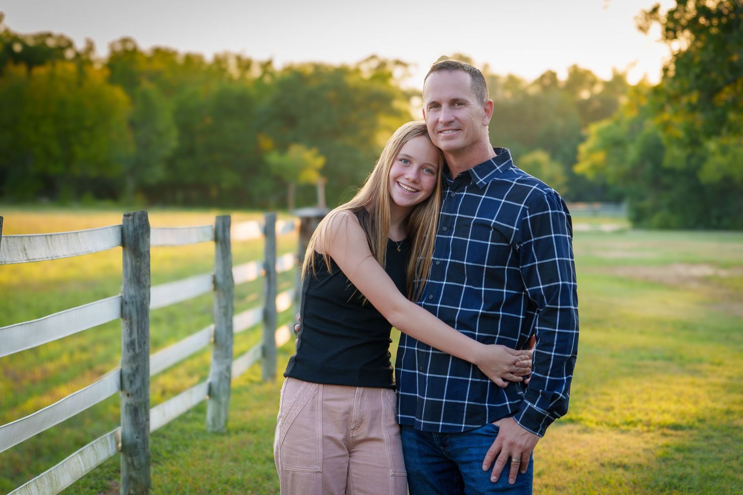 Fall family mini session Keller Texas Dad and daughter pose fall warm colors teenage kids  Christmas cards photos