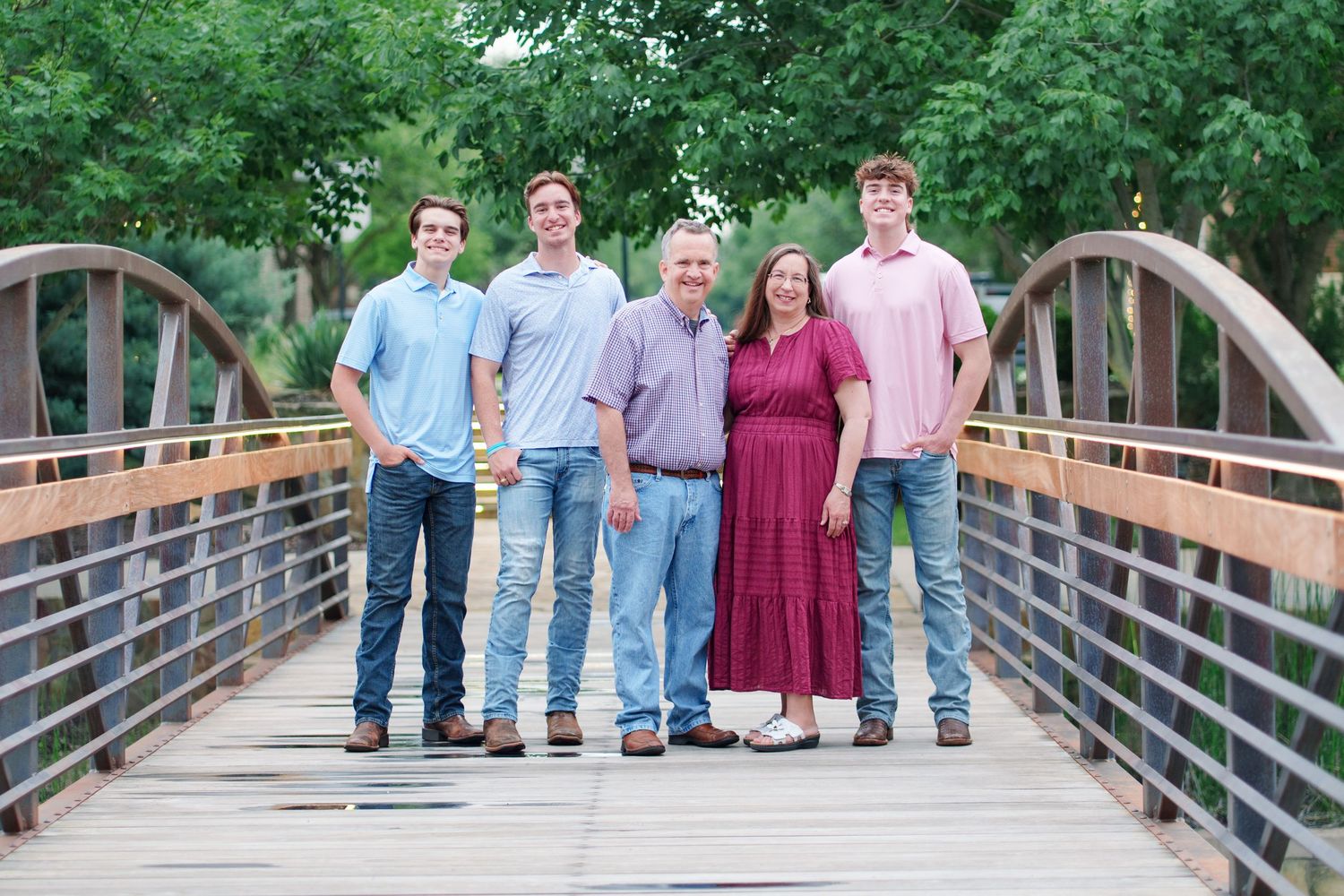 family photo session adult kids family of 5 Flower mound Texas fun moments 3 brothers waterfall outdoors