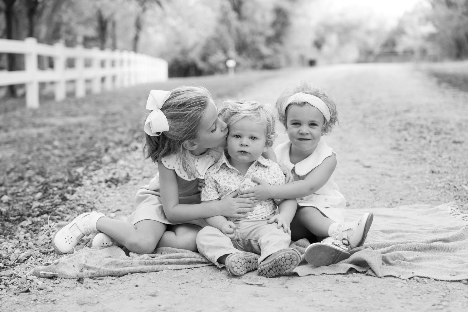fall family photos Trophy Club Park Texas found kids posing fall leaves matching outfits Christmas cards outdoors family of 5 black white