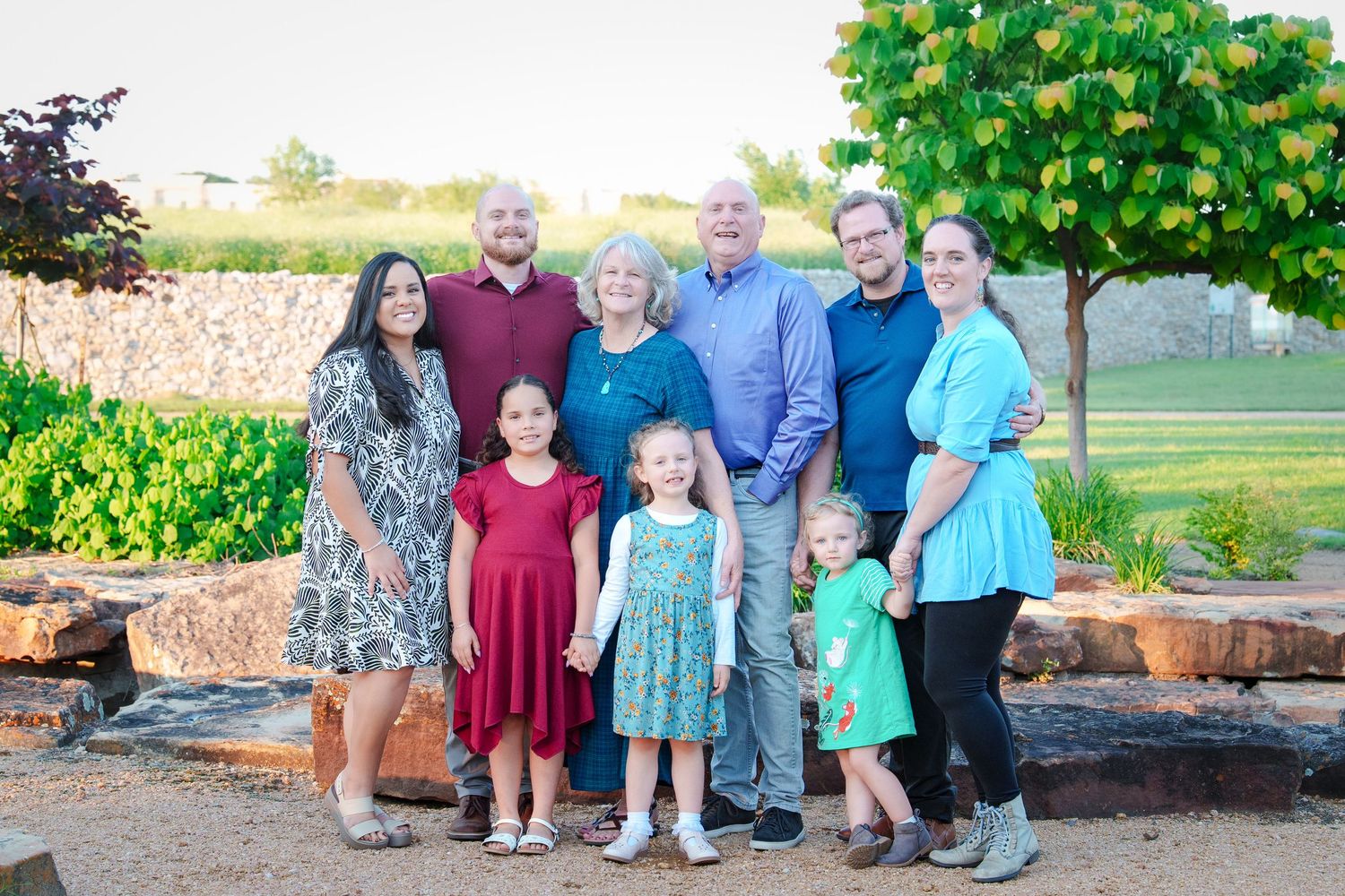 extended family photos celebrate father in law grandfather 80th birthday outdoors grandkids matching outfits Westlake Texas