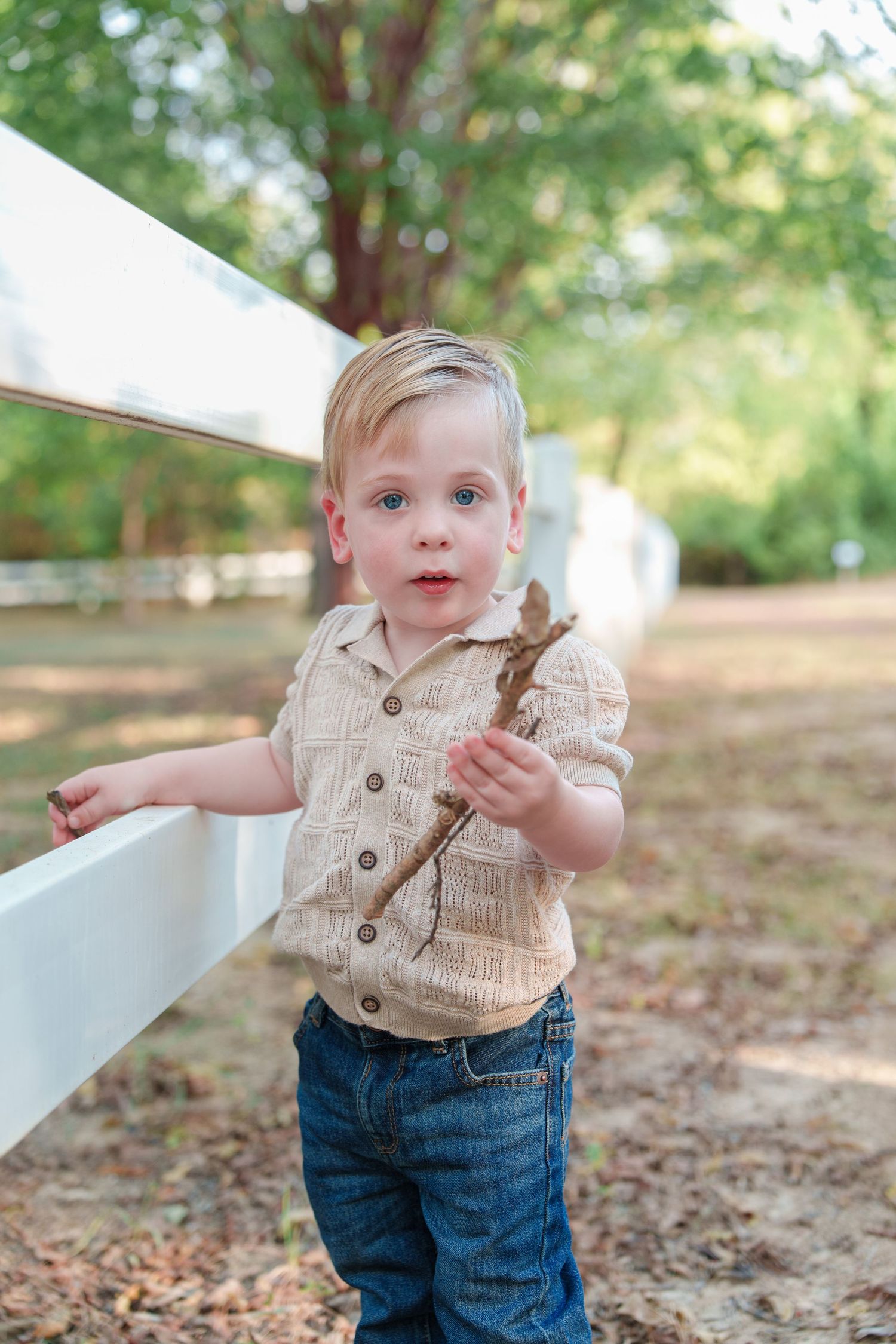 fall family photos Trophy Club Park Texas found kids posing fall leaves matching outfits Christmas cards outdoors family of 4 baby big bro