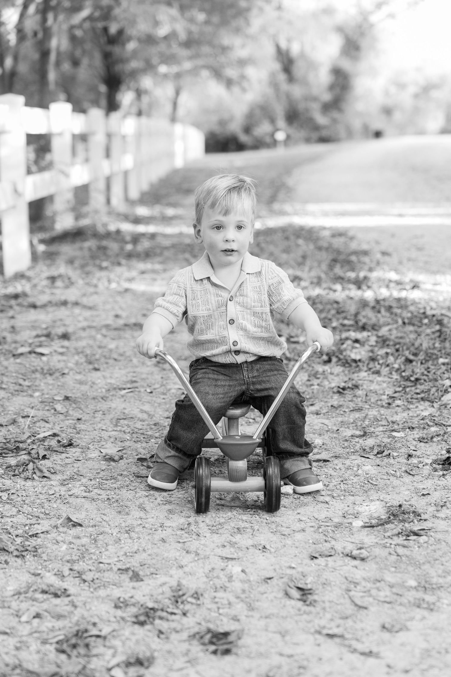 fall family photos Trophy Club Park Texas found kids posing fall leaves matching outfits Christmas cards outdoors family of 4 black white