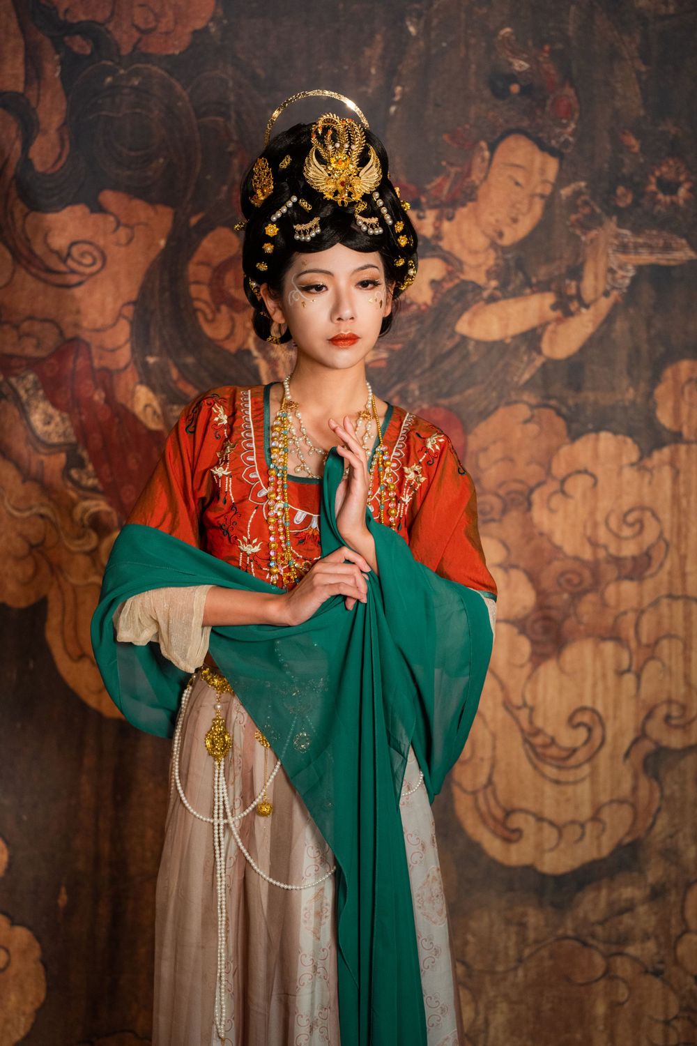 Divine studio photography of Dunhuang Apsaras Hanfu styling with cinematic lighting and mural backdrop, by Imagine Image Studio.