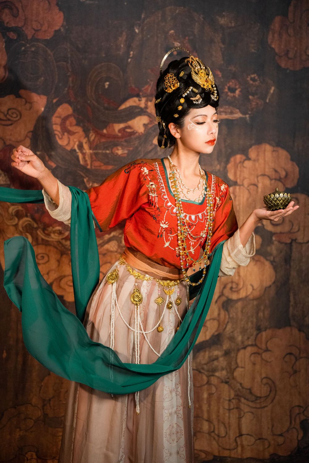 Divine studio photography of Dunhuang Apsaras Hanfu styling with cinematic lighting and mural backdrop, by Imagine Image Studio.
