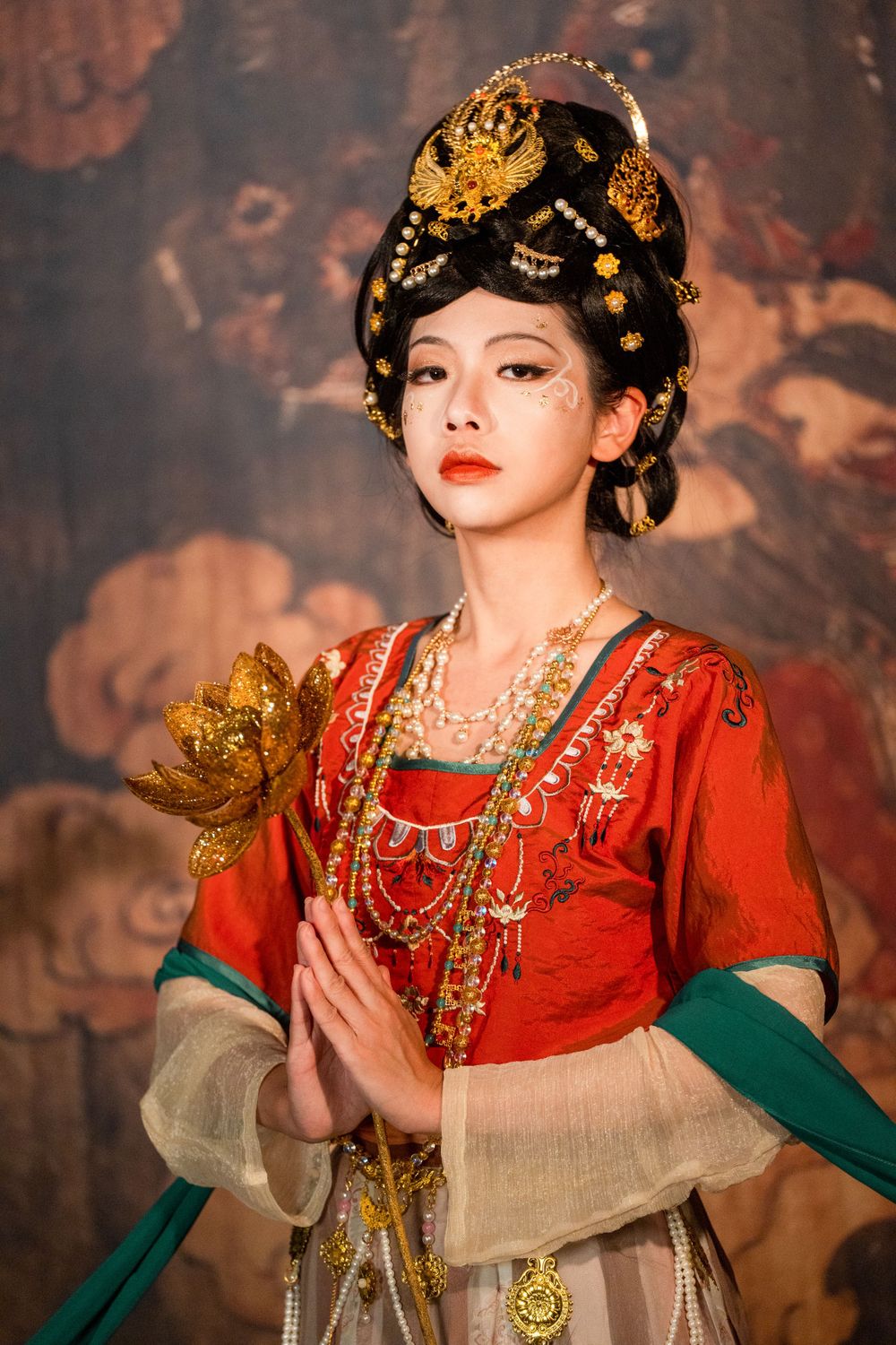Divine studio photography of Dunhuang Apsaras Hanfu styling with cinematic lighting and mural backdrop, by Imagine Image Studio.