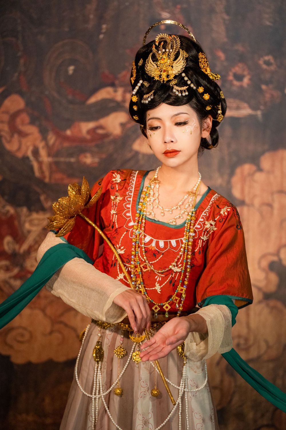 Divine studio photography of Dunhuang Apsaras Hanfu styling with cinematic lighting and mural backdrop, by Imagine Image Studio.