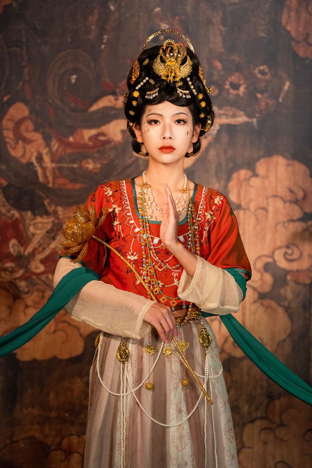 Sacred Tang Dynasty Hanfu portrait featuring Dunhuang styling and a cave mural background, by Imagine Image Studio Auckland.