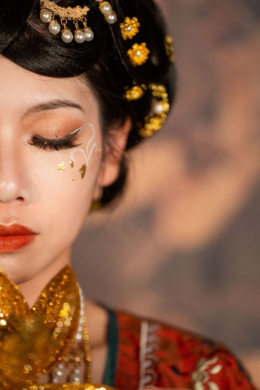 Cinematic solo portrait of divine Dunhuang Apsaras makeup in Tang Hanfu against a cave mural, by Imagine Image Studio Auckland.
