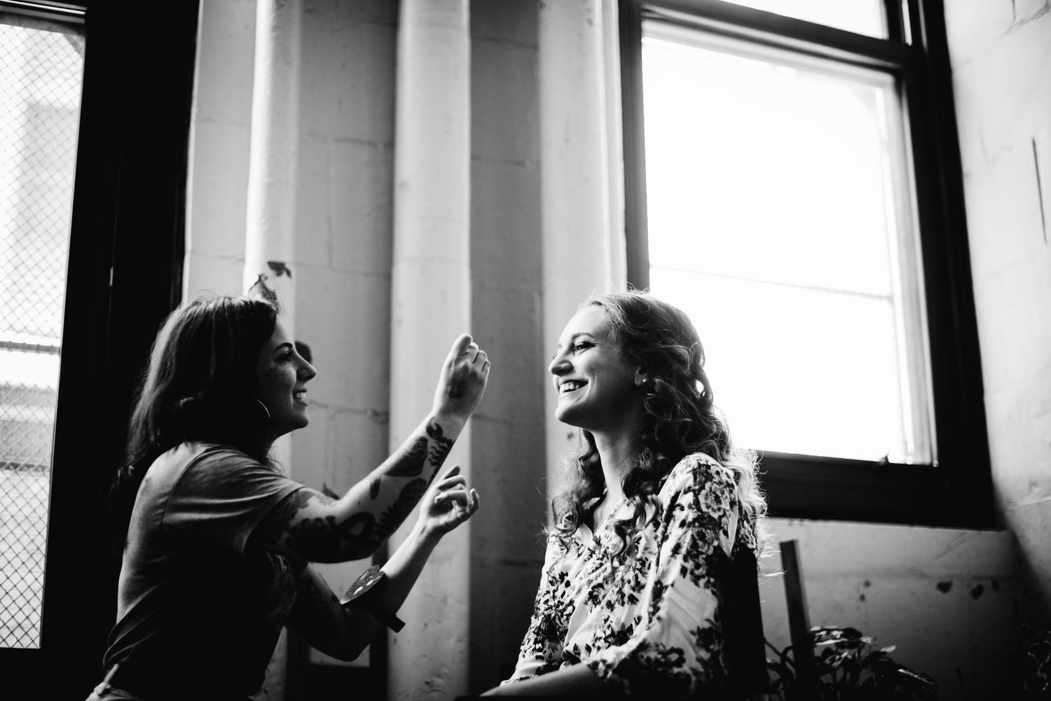 Jordan laughs with her makeup artist as they get ready for her day at Bok Bar, Philadelphia.
