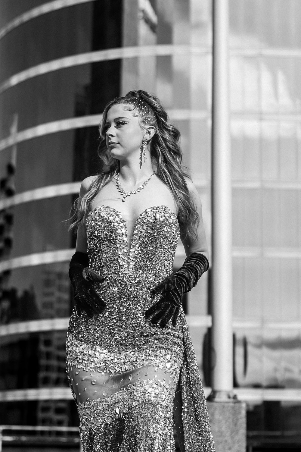 Black and white portrait series featuring an elegant sequined evening gown.