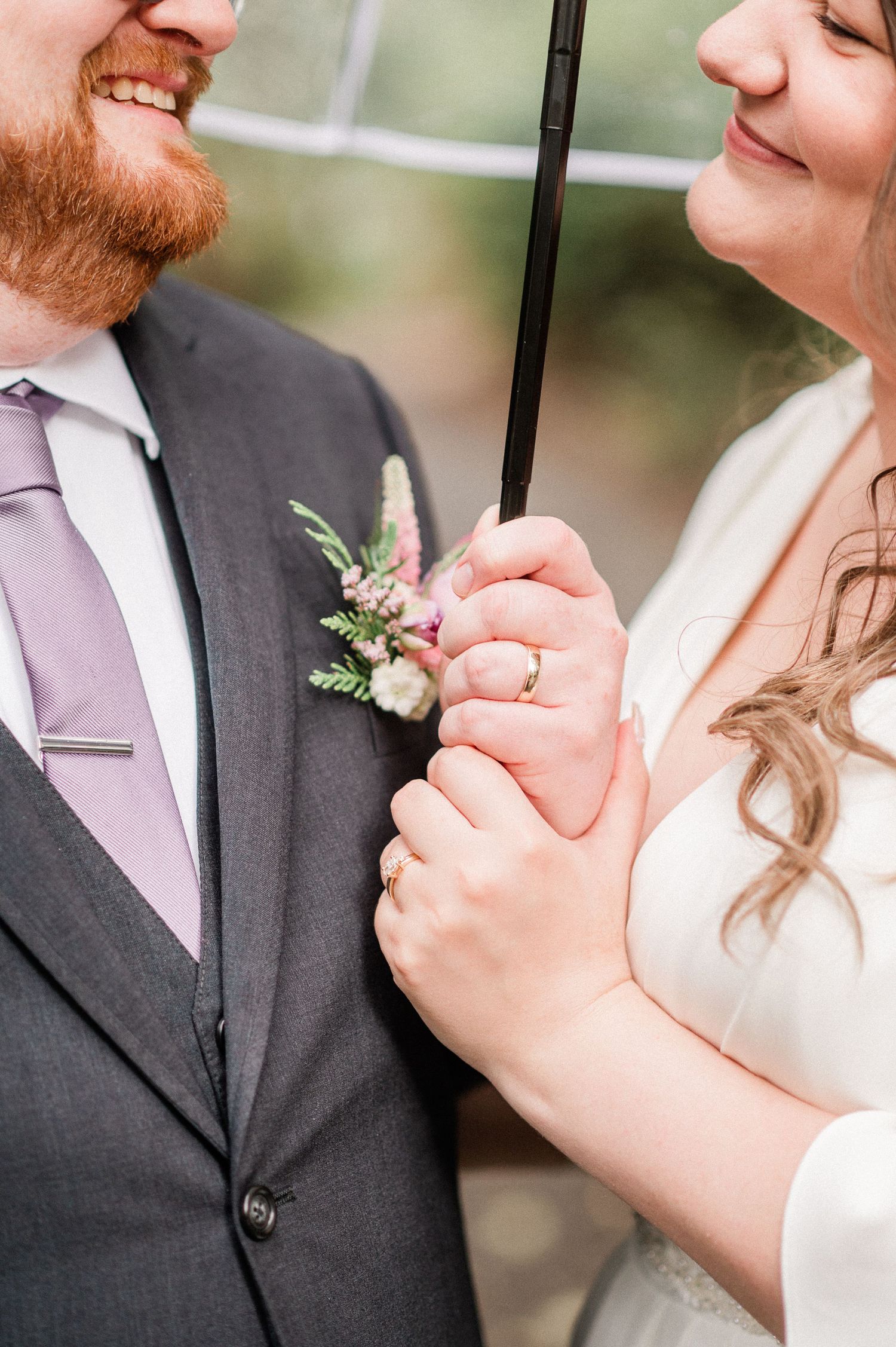 close up of rings on bride and groom. Photo by Harstine elopement photographer.