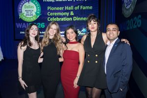 Five people posing at Pioneer Hall of Fame Ceremony & Celebration Dinner at Dallas event March 2026.