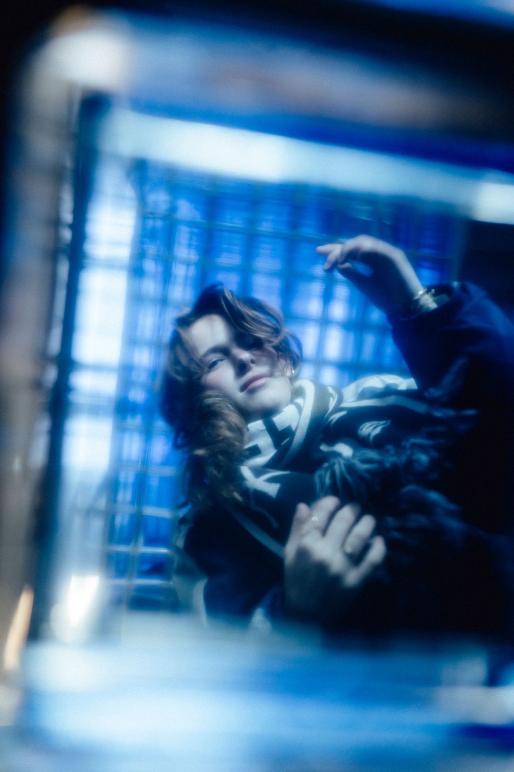Abstract sequence of blue-tinted motion blur images creating a dynamic visual effect.