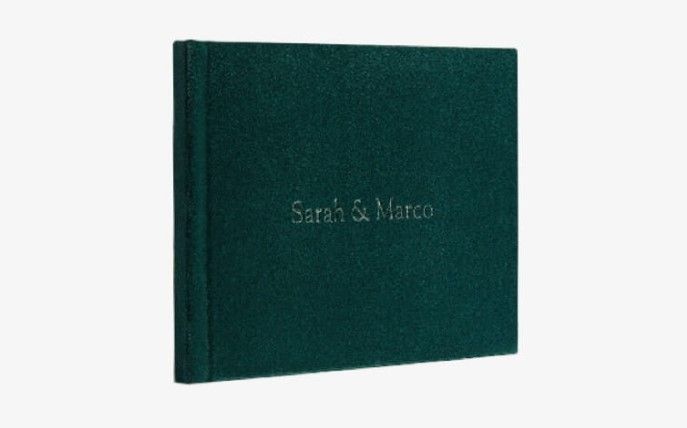 Detailed view of the textured surface of suede and velvet photo album cover.