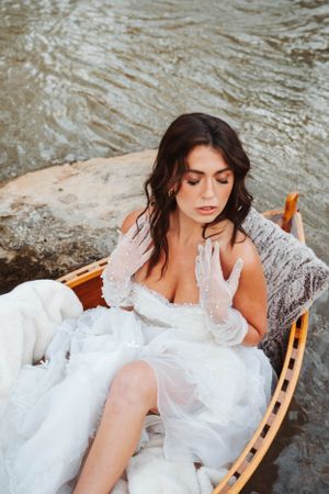 Beautiful vintage wedding dress with bridal boudoir session