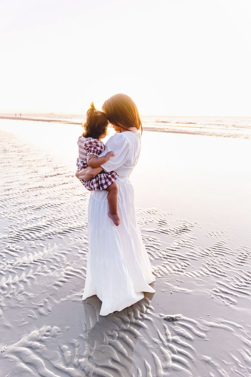 Family photographer Adelaide — parents and children laughing together outdoors, natural light lifestyle session — Photo By Nancy