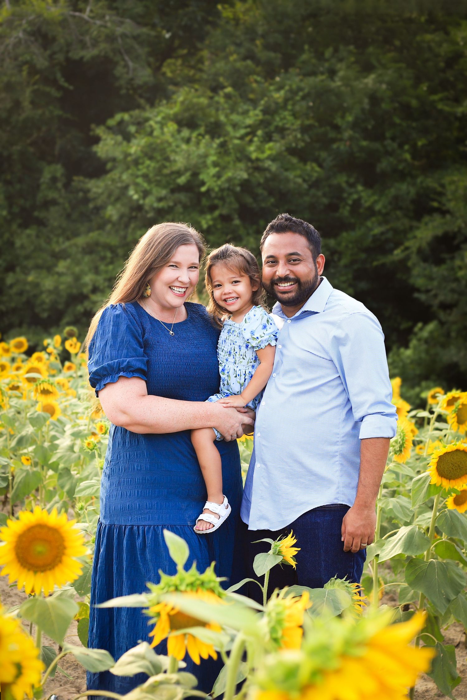 Family session on location at a sunflower farm in Gilbert, SC.
