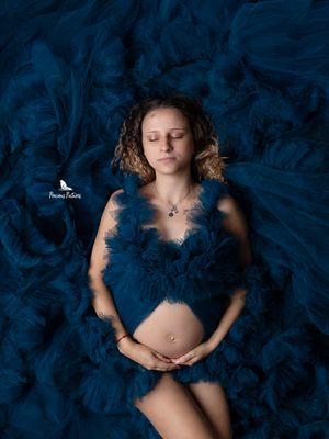 Fine art overhead maternity photography in a deep blue tulle gown by Precious Pictures, professional studio session in Malta