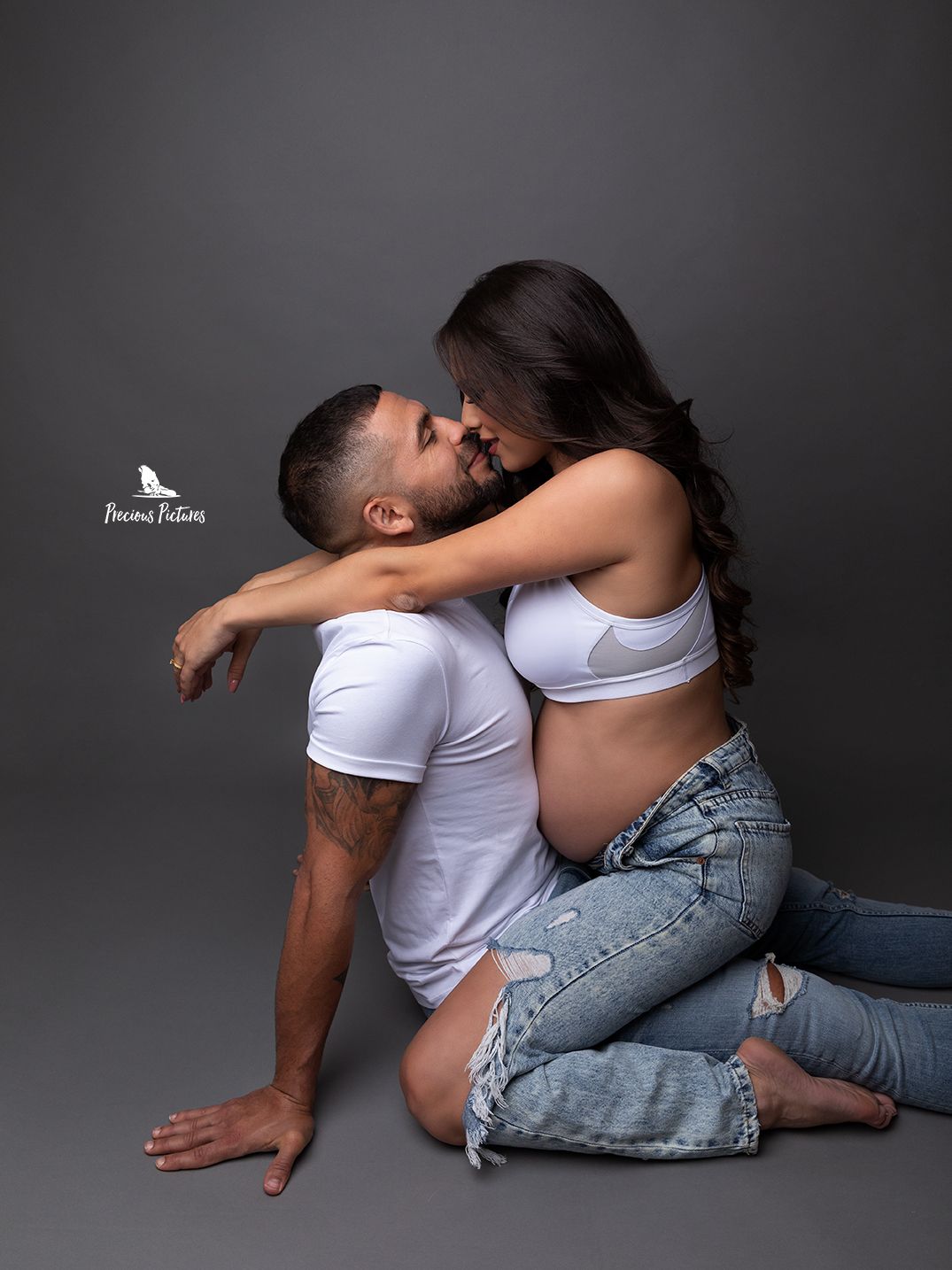 Joyful couple maternity session at Precious Pictures studio, Rabat, Malta