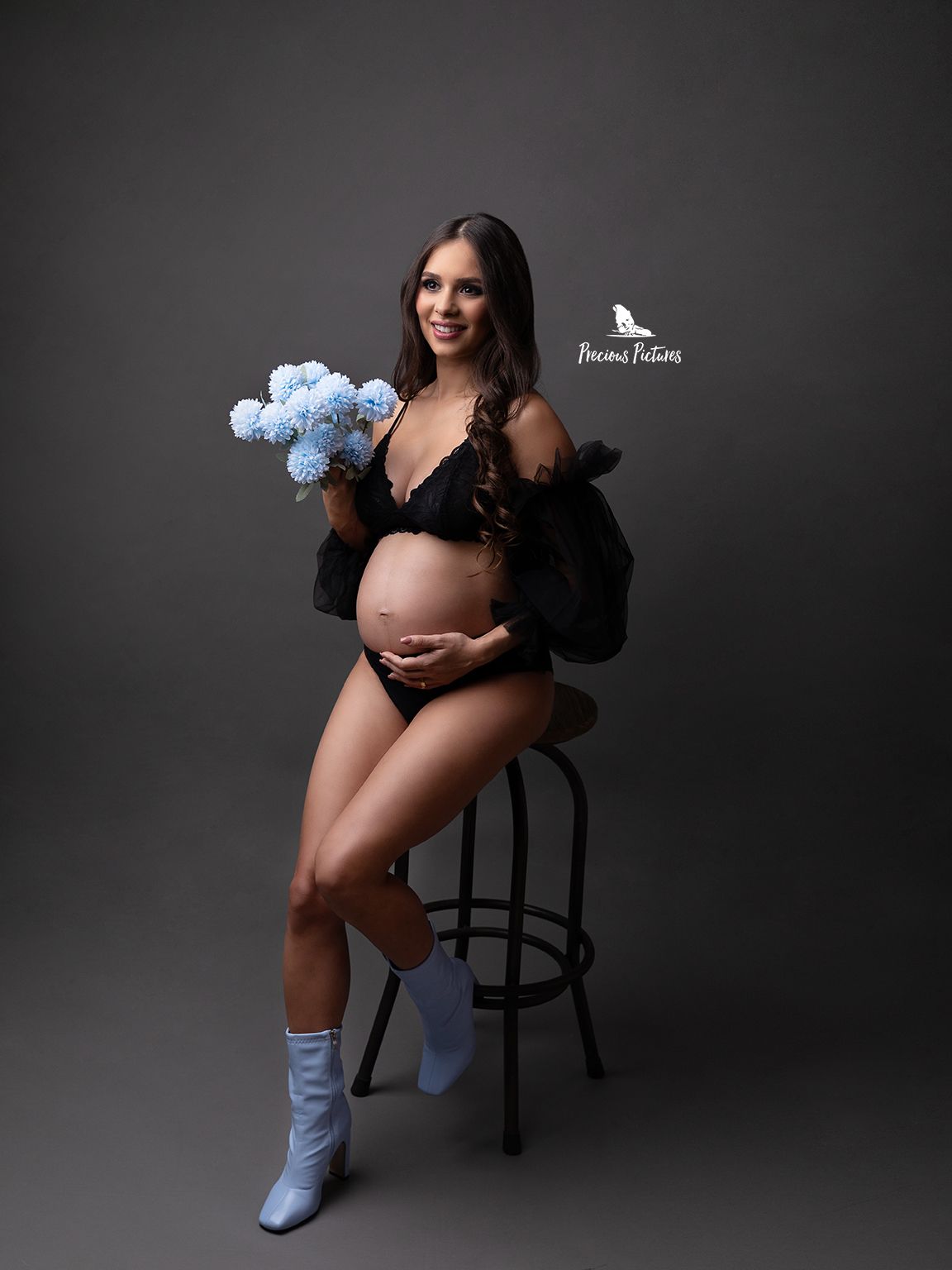 Beautiful studio maternity photography featuring blue flowers, Precious Pictures Malta