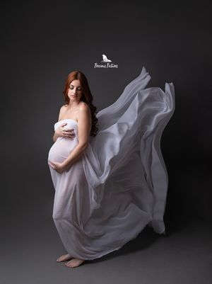 Artistic studio maternity photography with flowing white fabric, elegant and timeless portrait by Precious Pictures, Malta