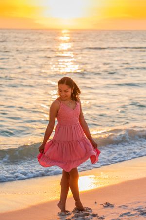 senior portrait session dancing in the sunset on Panama City Beach