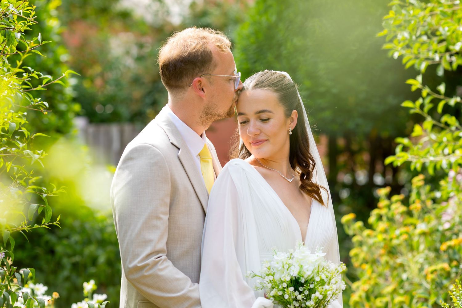 Bride and groom in the gardens near White Horse Romsey.
