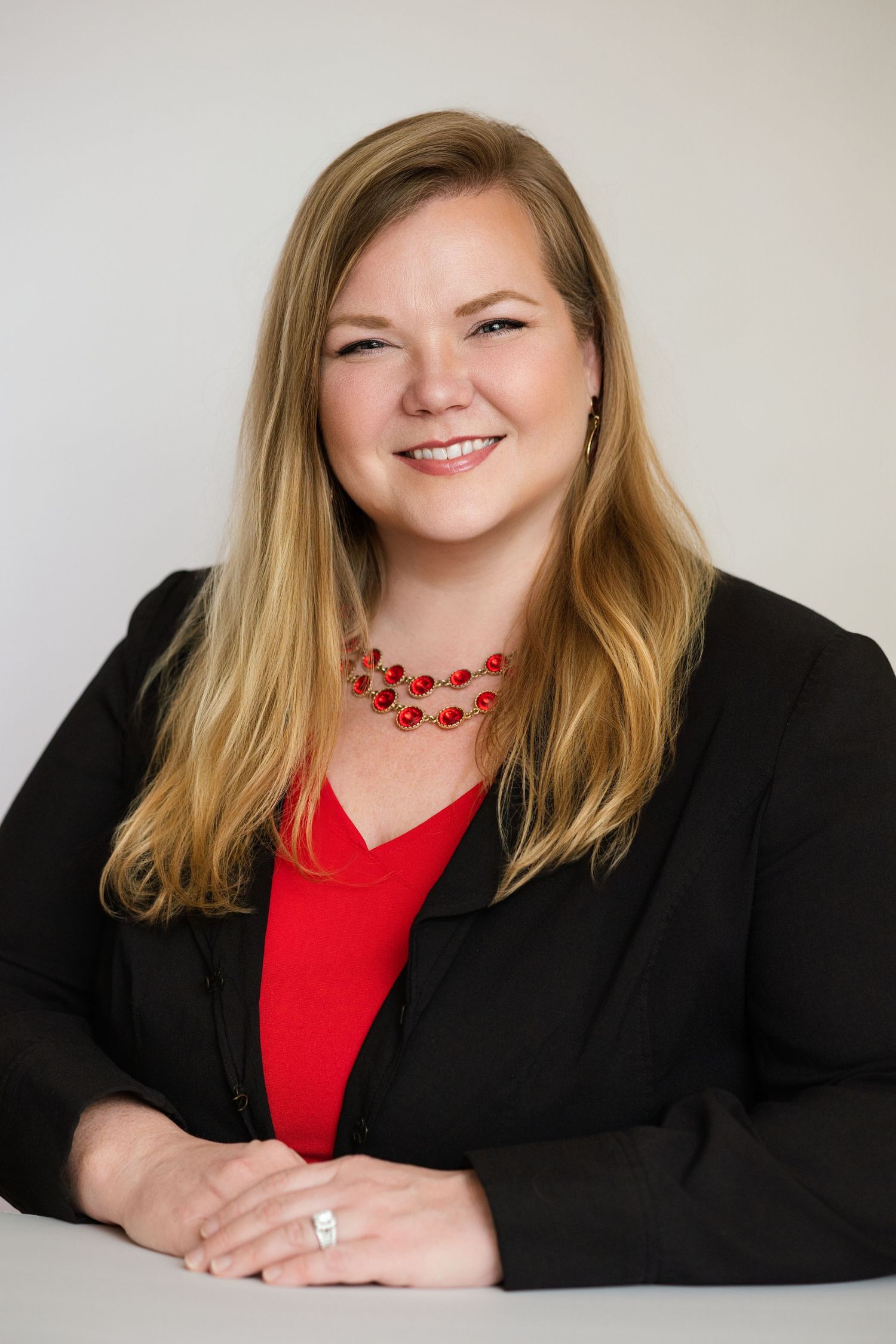 Professional headshot for a director in the insurance industry