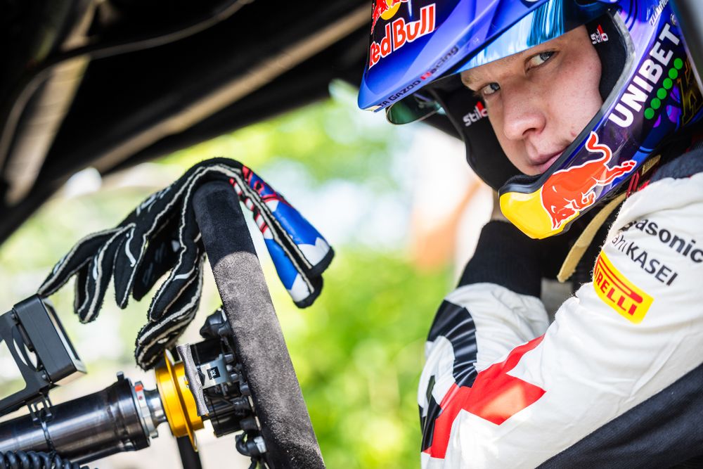 Close up view of racing equipment and controls inside rally car cockpit.