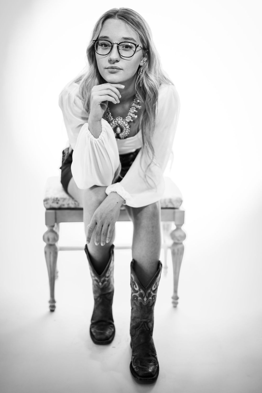 Black-and-white studio portrait of a high school senior girl in Mountain Home, Arkansas