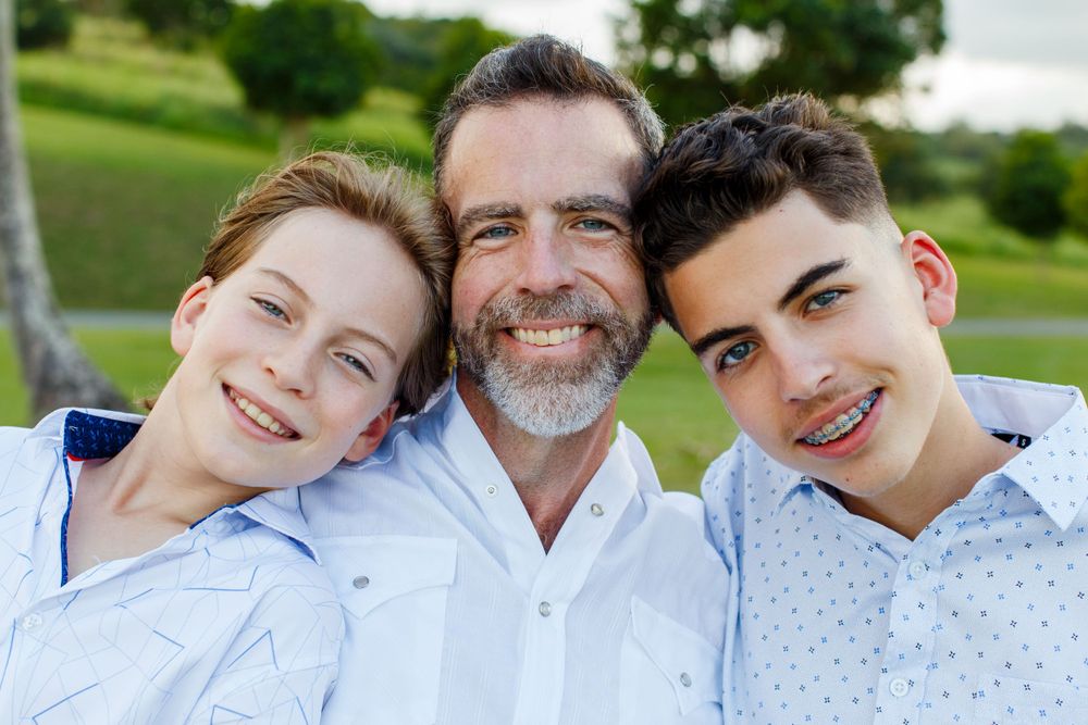 Father and sons family portrait. Palmas Del Mar, Puerto Rico.