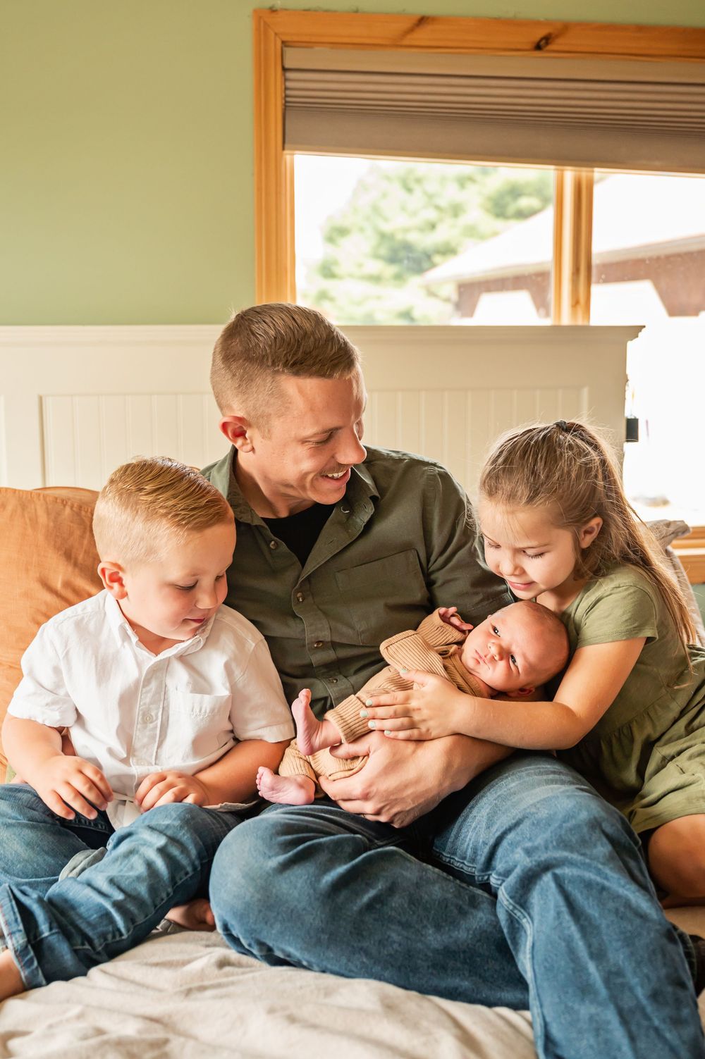 A heartwarming sequence of candid family moments showing affectionate interactions while relaxing together on a couch.