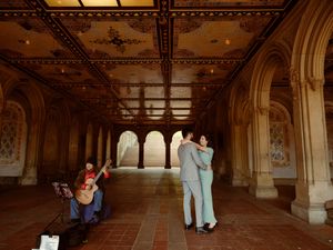 Ornate architectural details and arches line the interior hallway of Bethesda Terrace in Central Park, New York City.