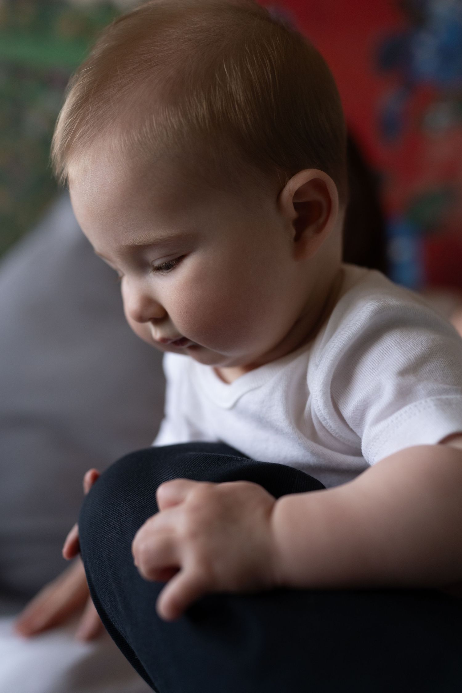 Close-up series showing a baby's hand reaching and touching in black and white.