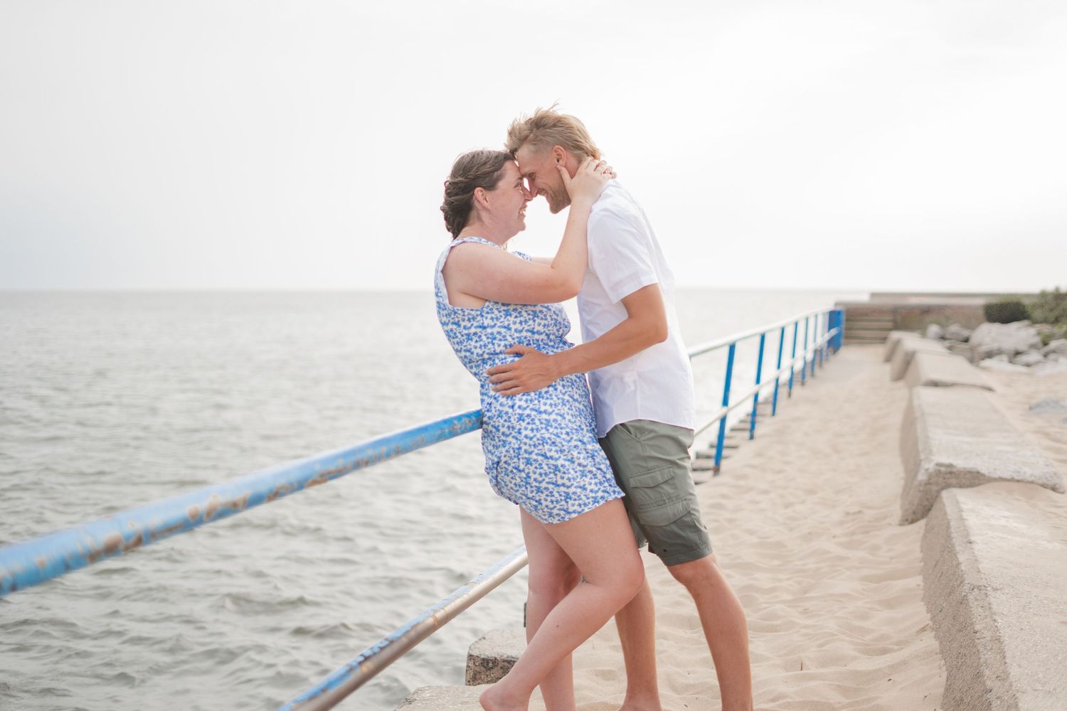 A couple with their heads together.