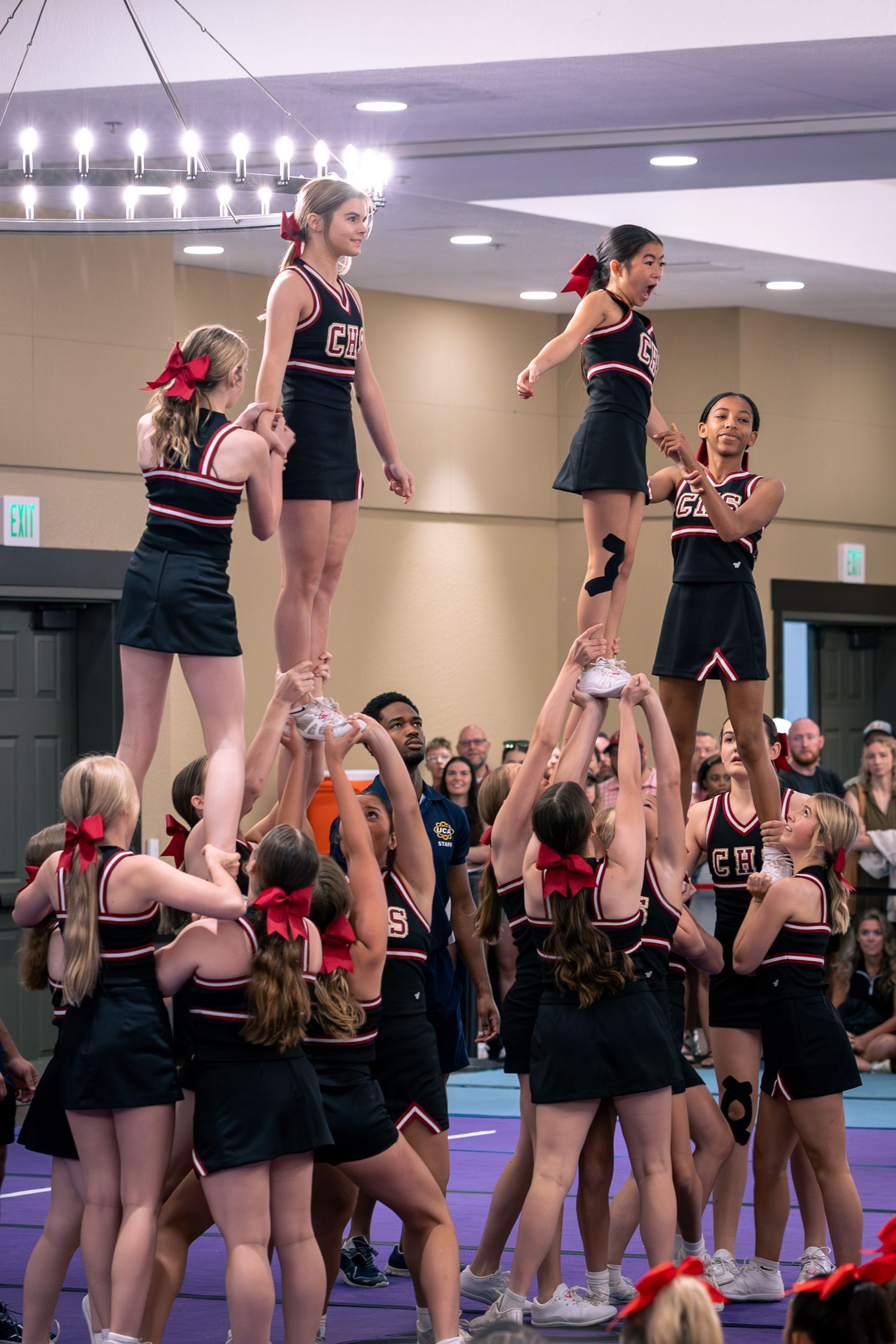 Drew Arnold Photography Middle School Cheer stunting photo