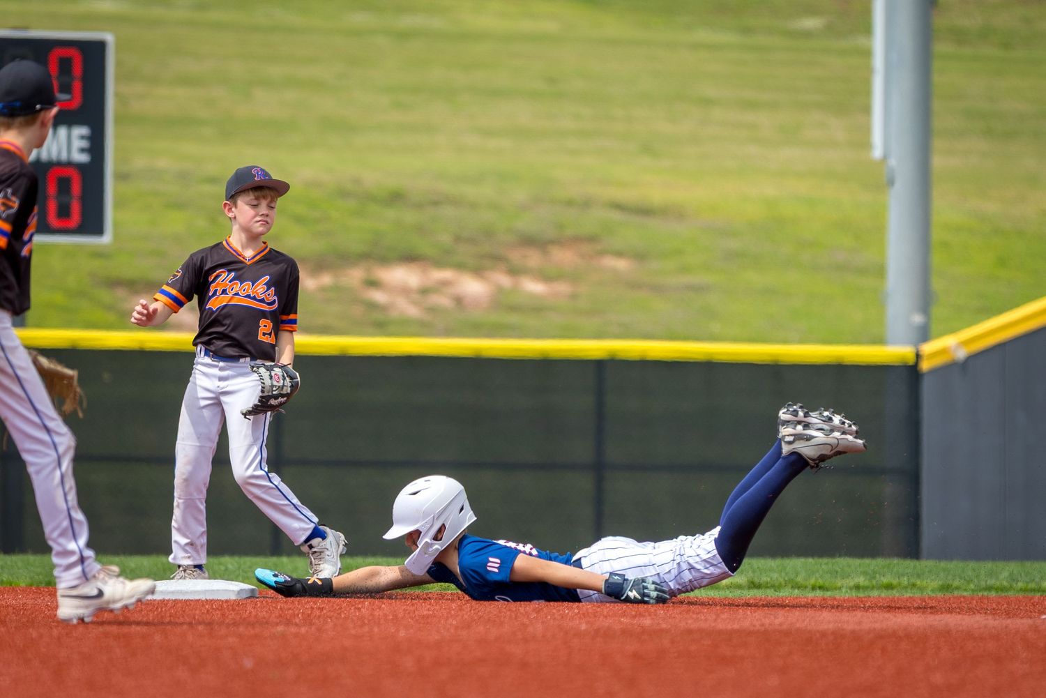 Drew Arnold Photography Youth baseball sliding to second