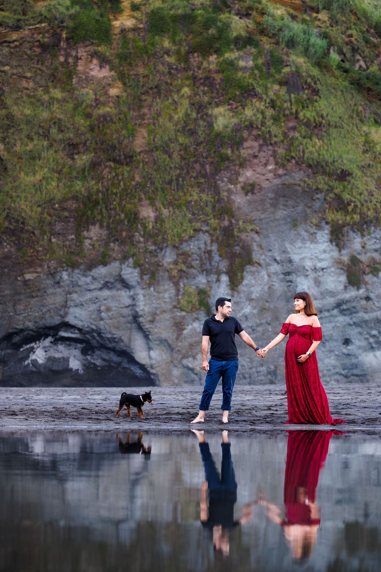 Couple sharing a moment with their first ecography of their baby.