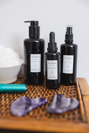 Maple Valley Acupuncture product photo of facial oils and gua sha tools