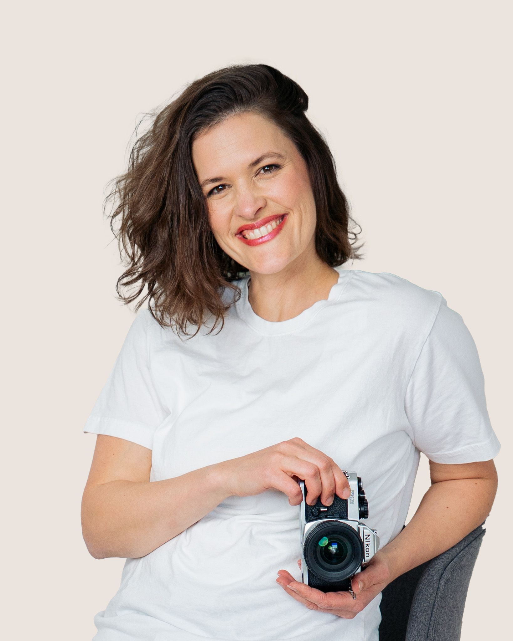 Series of photos showing a photographer holding and using a vintage camera.