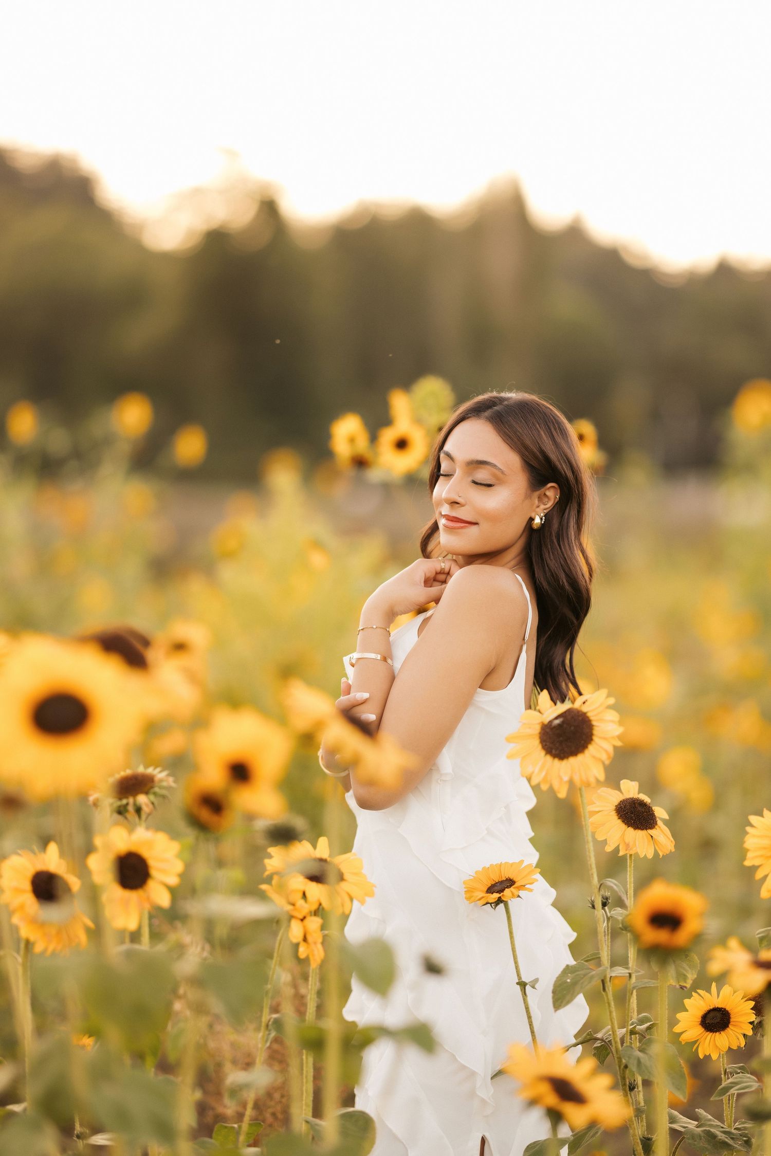 A collection of ethereal photos in a sunflower field at sunset with warm golden light.