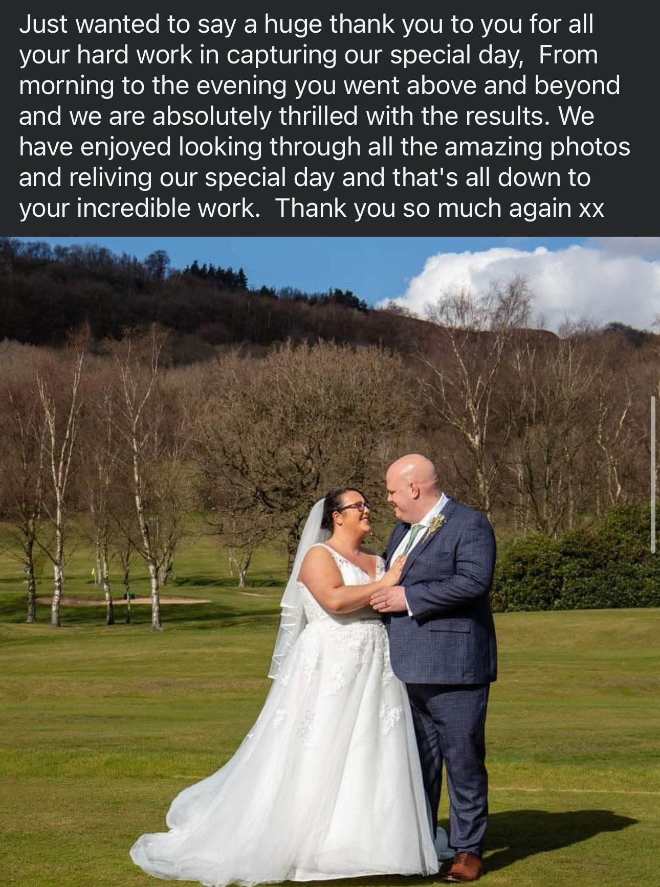 A romantic outdoor wedding photo captured on a golf course with rolling hills and forest in the background.