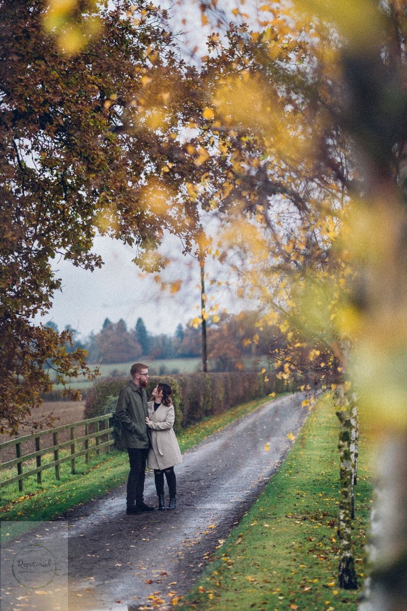 Wedding pre shoot portrait of bride and groom to be taken in autumn